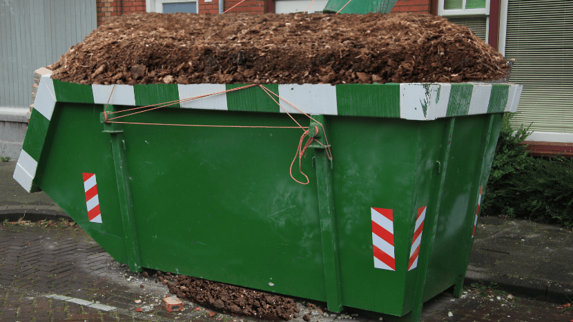 dumpster full of dirt